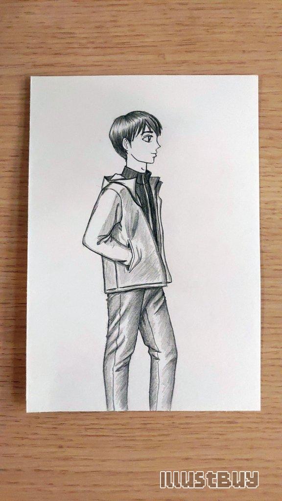The side view of a boy with his hands in his pockets