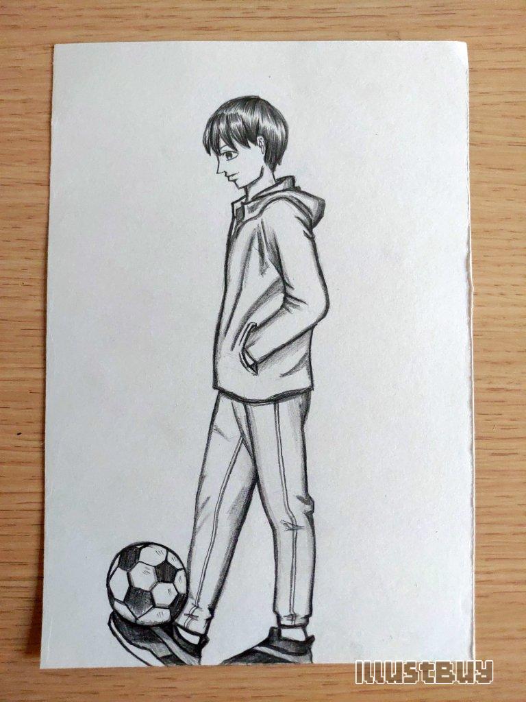 The side view of boys playing football